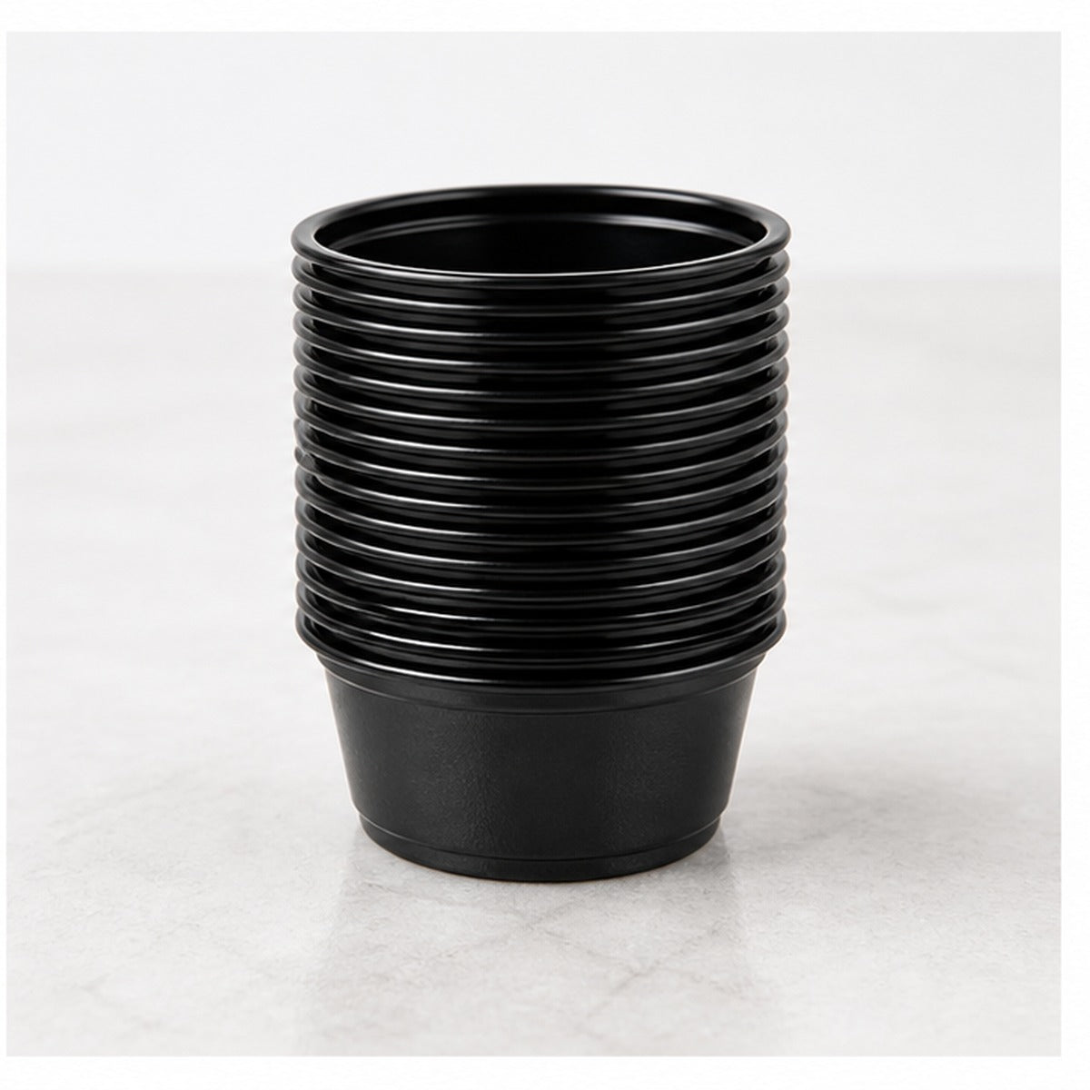 1.5 oz. Black Plastic Souffle Cup / Portion Cup - 2,500/Case