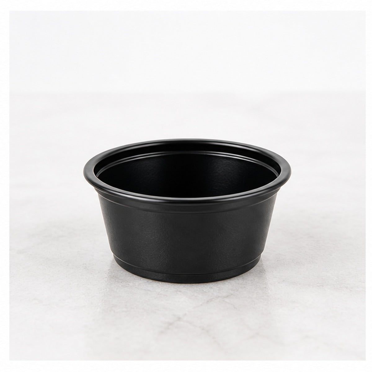 1.5 oz. Black Plastic Souffle Cup / Portion Cup - 2,500/Case