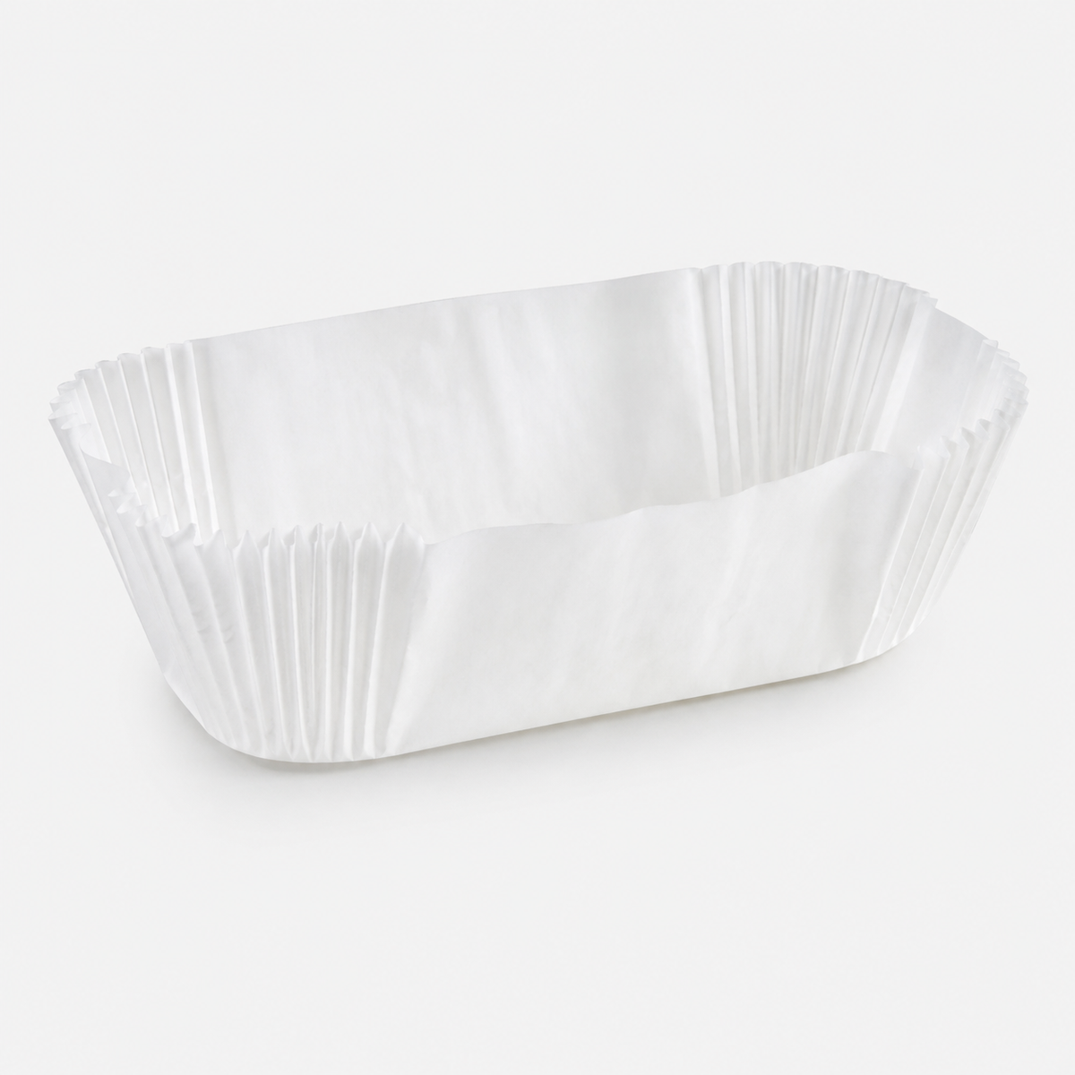 6 7/8" x 2 7/8" x 2 1/4" White Fluted Oblong Loaf Liners - 5,000/Case